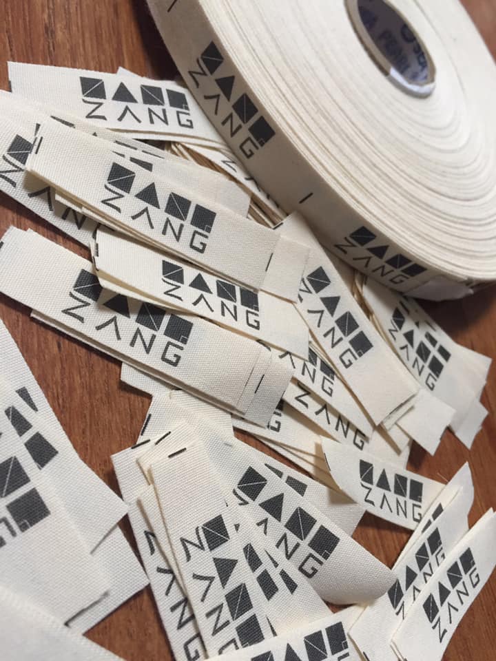 Zang Studio brand label on natural fabric